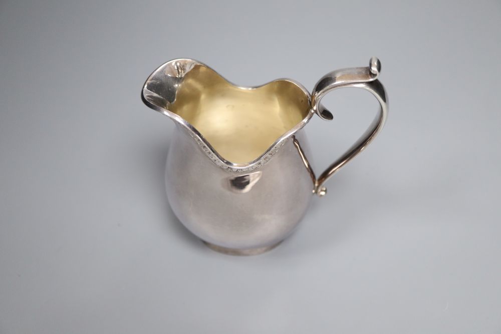 A George V Asprey & Co Ltd silver milk jug, London, 1915, 12.6cm, 5.5oz.